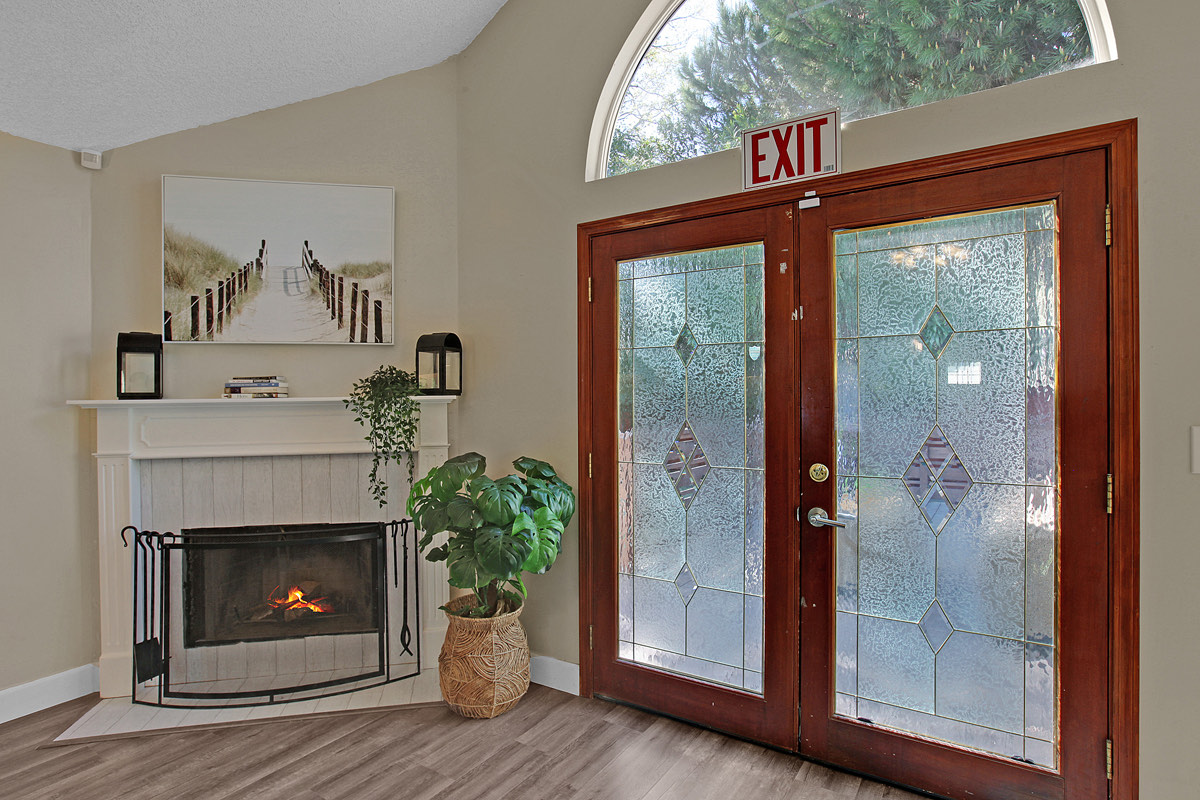 The front doors and fireplace